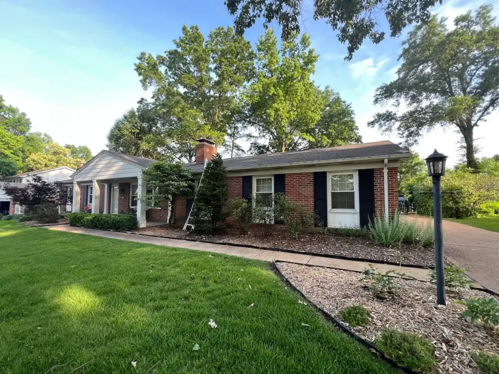 Cardinal Contractors crew on site for residential roof replacement at brick ranch home in St. Louis MO