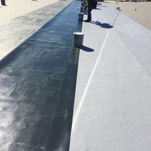 Flat roof repair in St. Louis MO by Cardinal Contractors